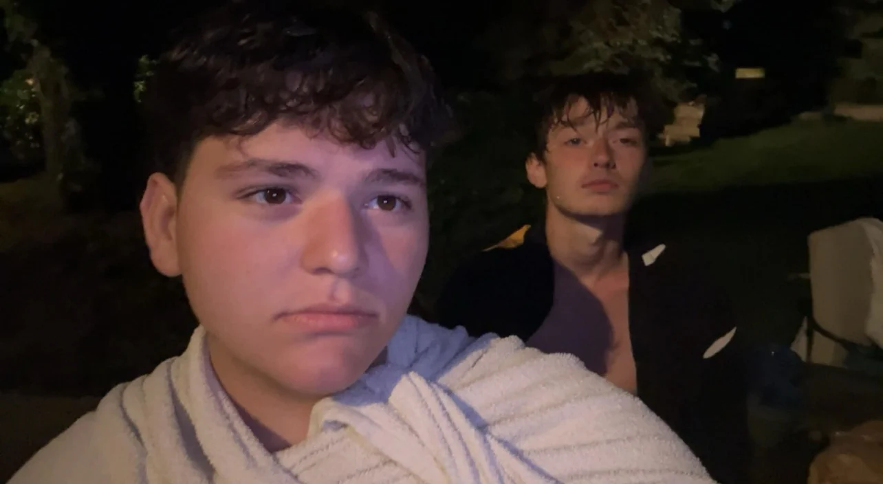 Dominic and Derek together during an evening outside