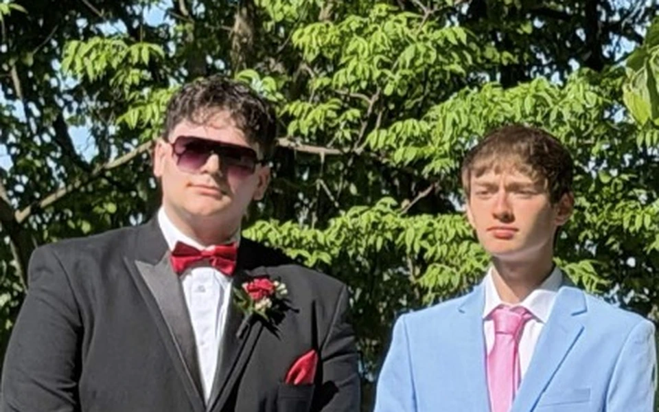 Dominic and Derek dressed formally together